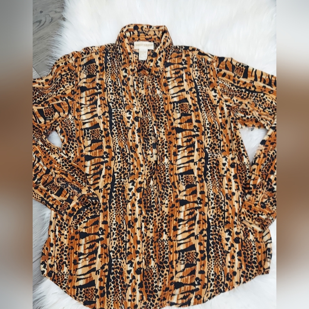 100% Silk Christie& Jill Gorgeous Animal print long sleeve blouse. Super Soft!